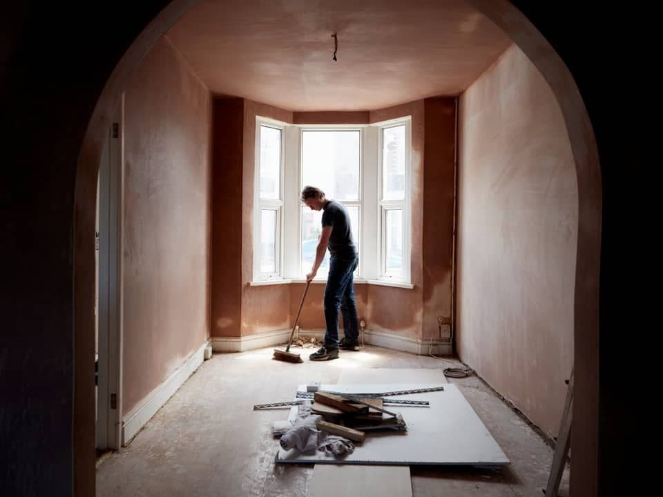 Interior remodel in progress — bay window room prepped for new finishes